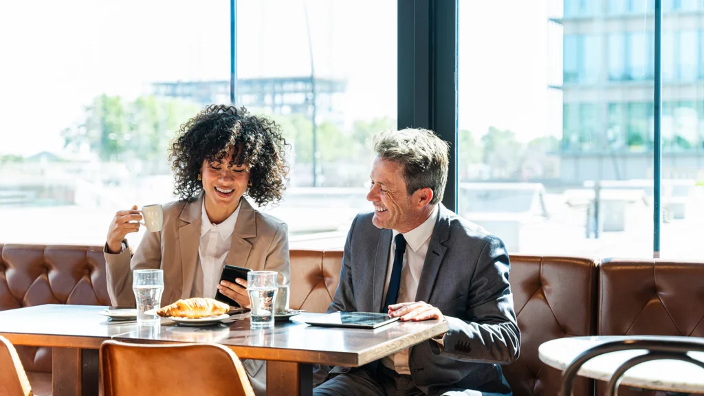 two workers doing breakfast